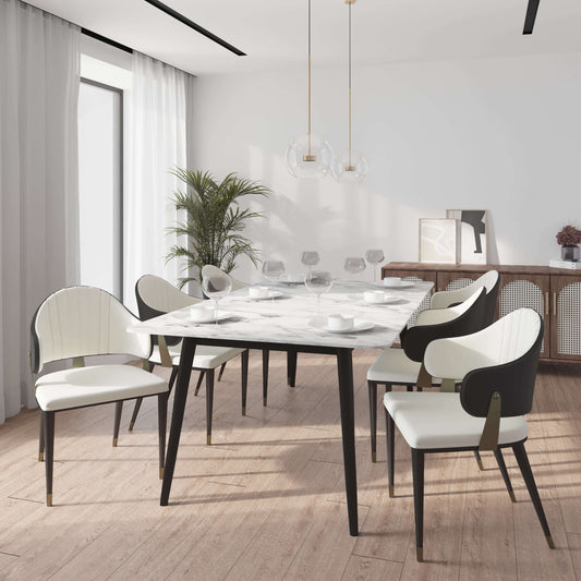 Zayle 7-Piece Dining Set with 55" Rectangular Dining Table in White/Gold Sintered Stone Top and 6 Leather Dining ChairsElevate your dining experience with the luxurious Zayle 7-Piece Dining Set. The sleek 55" rectangular table features a stunning white an