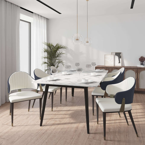 Zayle 7-Piece Dining Set with 55" Rectangular Dining Table in White/Gold Sintered Stone Top and 6 Leather Dining ChairsElevate your dining experience with the luxurious Zayle 7-Piece Dining Set. The sleek 55" rectangular table features a stunning white an