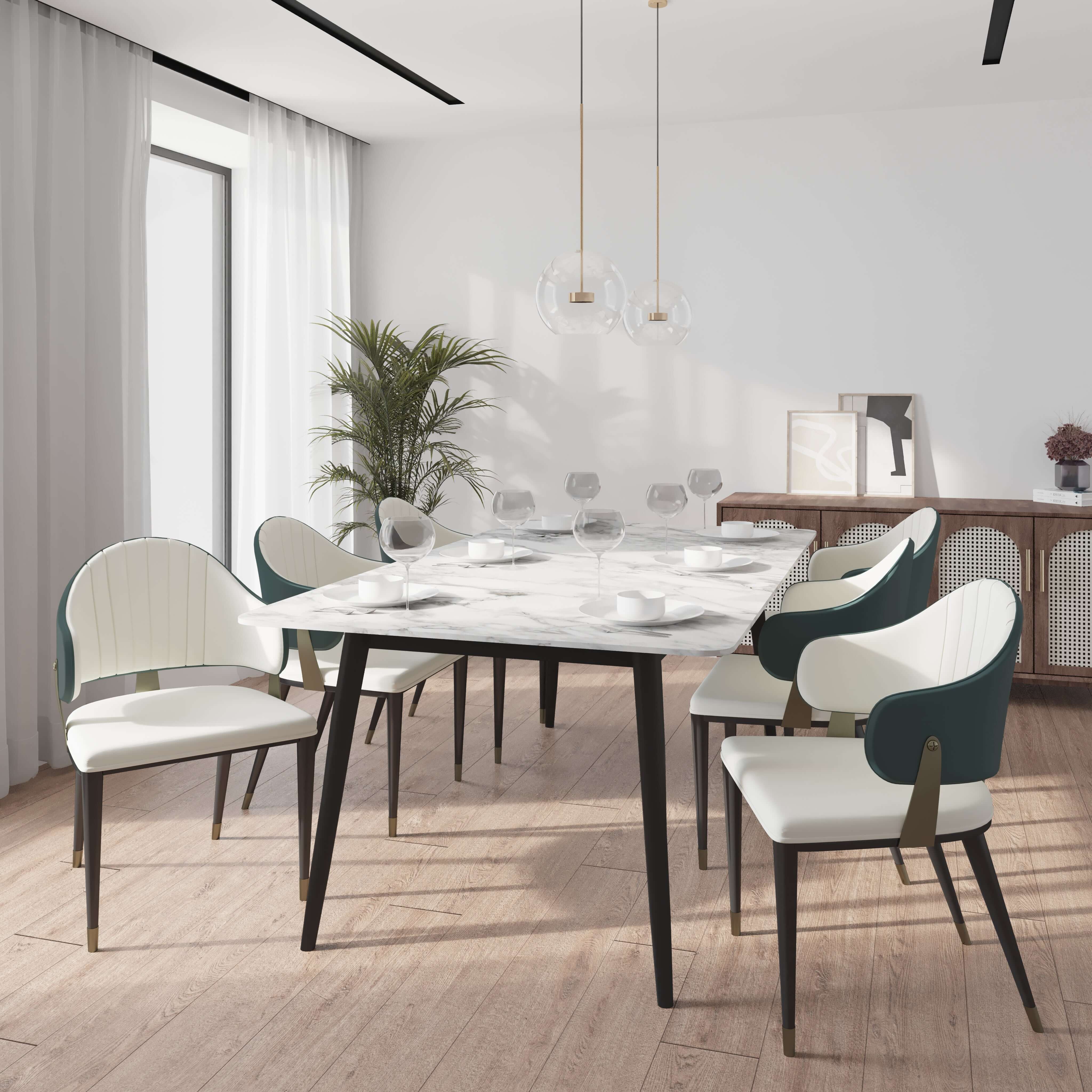 Zayle 7-Piece Dining Set with 55" Rectangular Dining Table in White/Gold Sintered Stone Top and 6 Leather Dining ChairsElevate your dining experience with the luxurious Zayle 7-Piece Dining Set. The sleek 55" rectangular table features a stunning white an