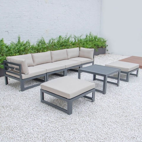 Chelsea 7-Piece Patio Ottoman Sectional And Coffee Table Set Black Aluminum With Cushions
