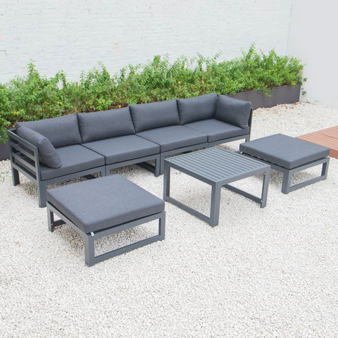 Chelsea 7-Piece Patio Ottoman Sectional And Coffee Table Set Black Aluminum With Cushions