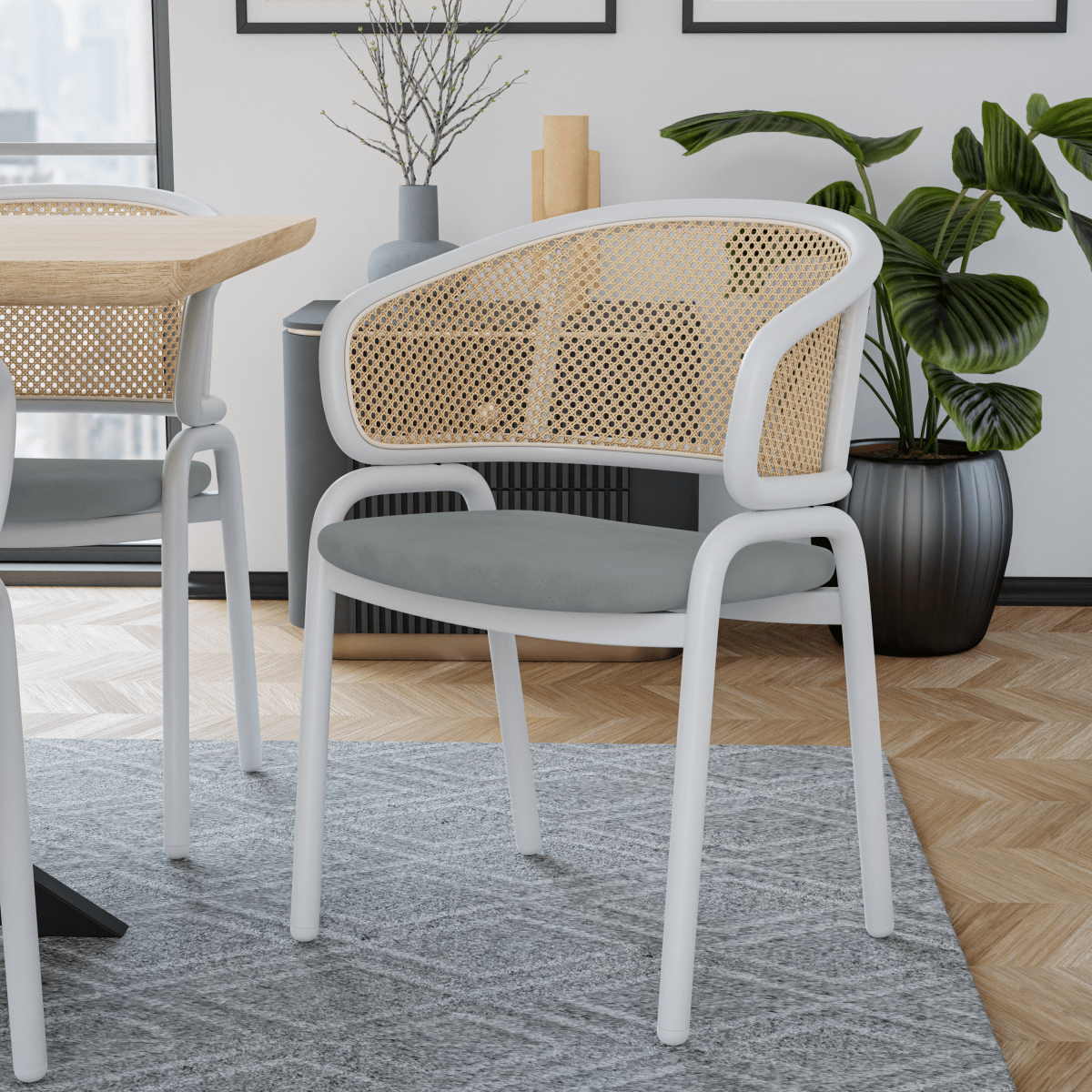 Ervilla Leather Dining Armchair in Black/White Stainless Steel Base With Wicker Back