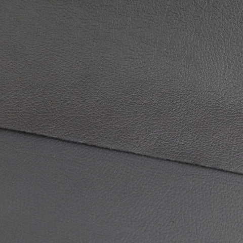 Kora Dining Chair Upholstered in Leather with Stainless Steel Frame and Legs
