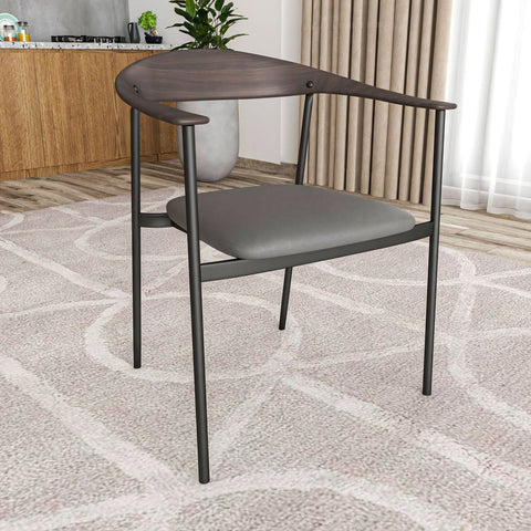 Kora Dining Chair Upholstered in Leather with Stainless Steel Frame and Legs