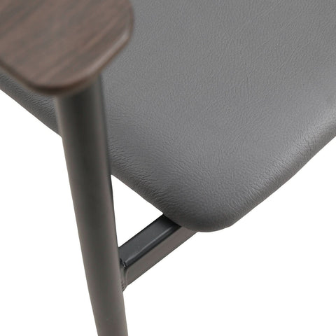 Kora Dining Chair Upholstered in Leather with Stainless Steel Frame and Legs