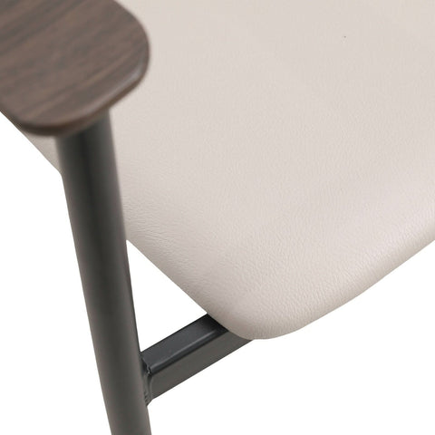 Kora Dining Chair Upholstered in Leather with Stainless Steel Frame and Legs
