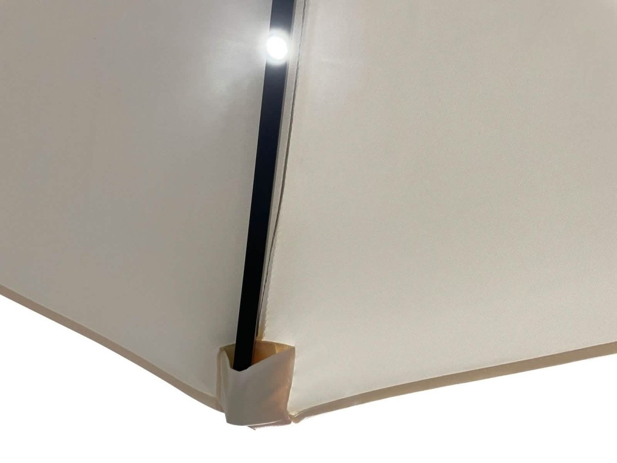 Sierra 9' Outdoor Patio Tilt Market Umbrella with Solar LED Lights Cream Leisuremod